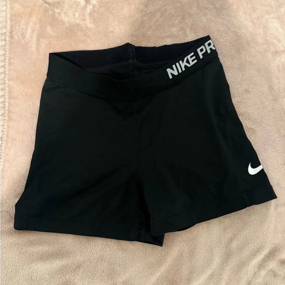 Nike Women's Black Athletic Compression Shorts with White Swoosh